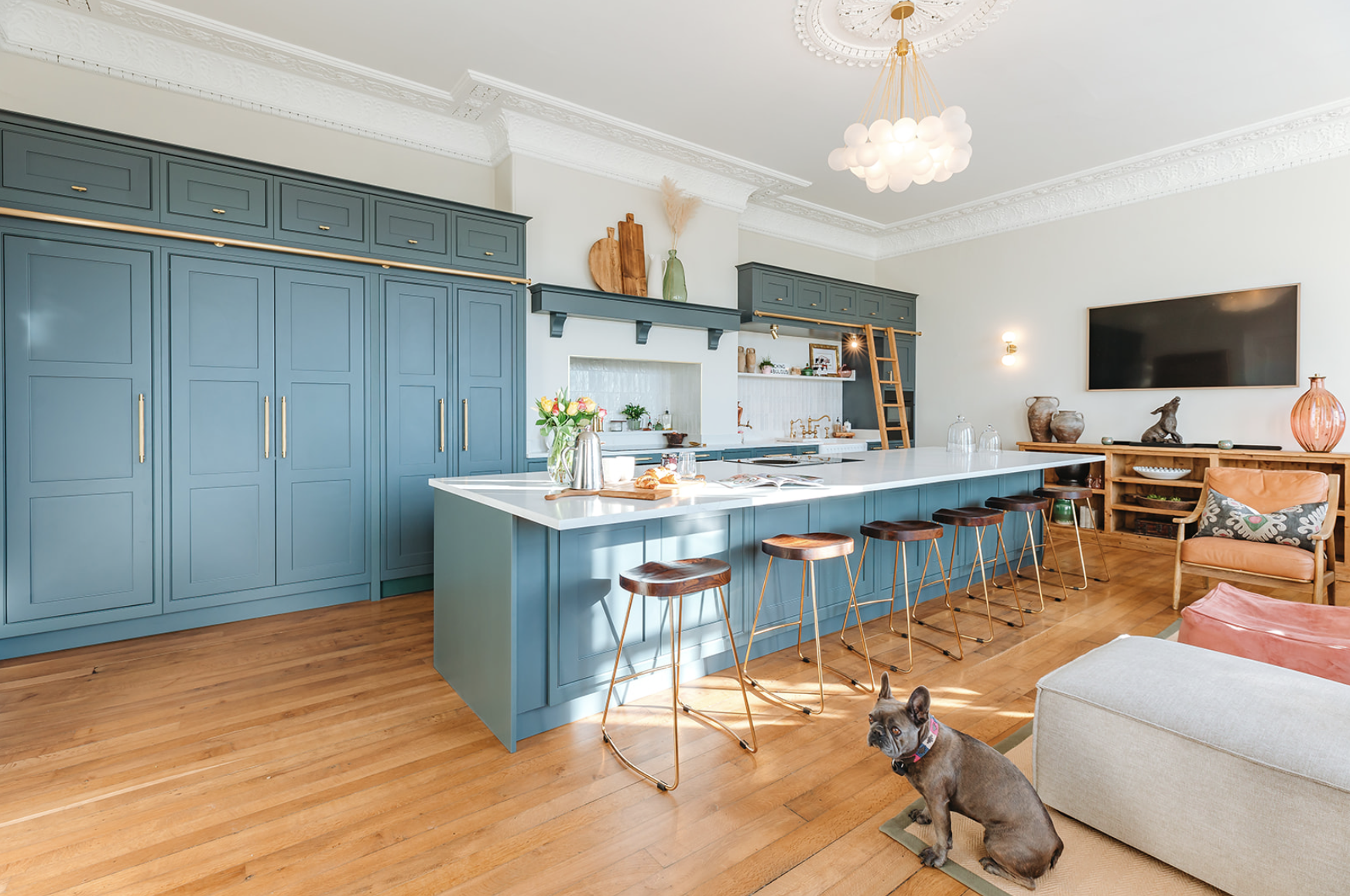 Teal inframe kitchen with library ladder in a Georgian room