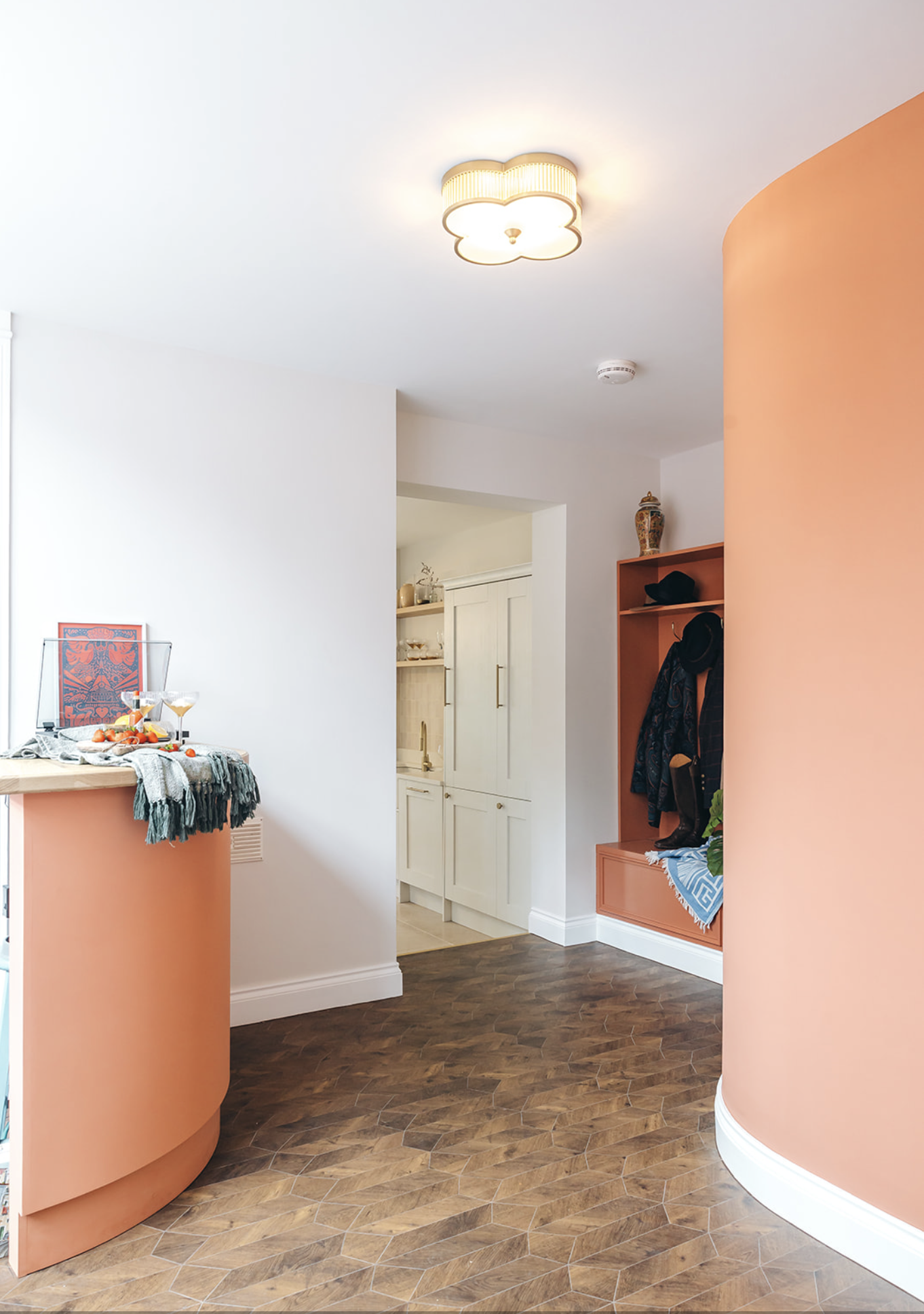 Curved terracotta hallway in a remodelled period home